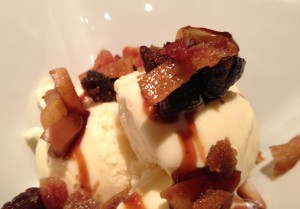 Mission figs & apples simmered in maple syrup brown sugar sauce, w candied bacon & vanilla ice cream.